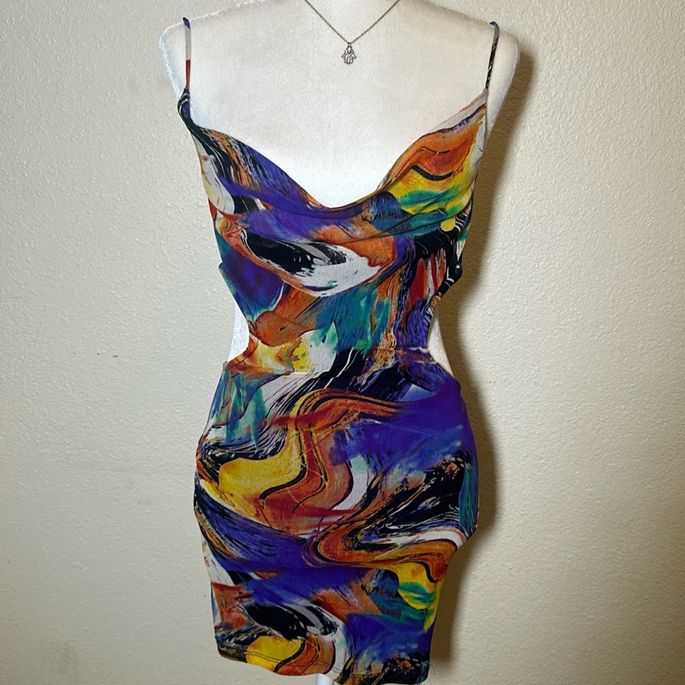 Really nice multi color dress . Kinda backless